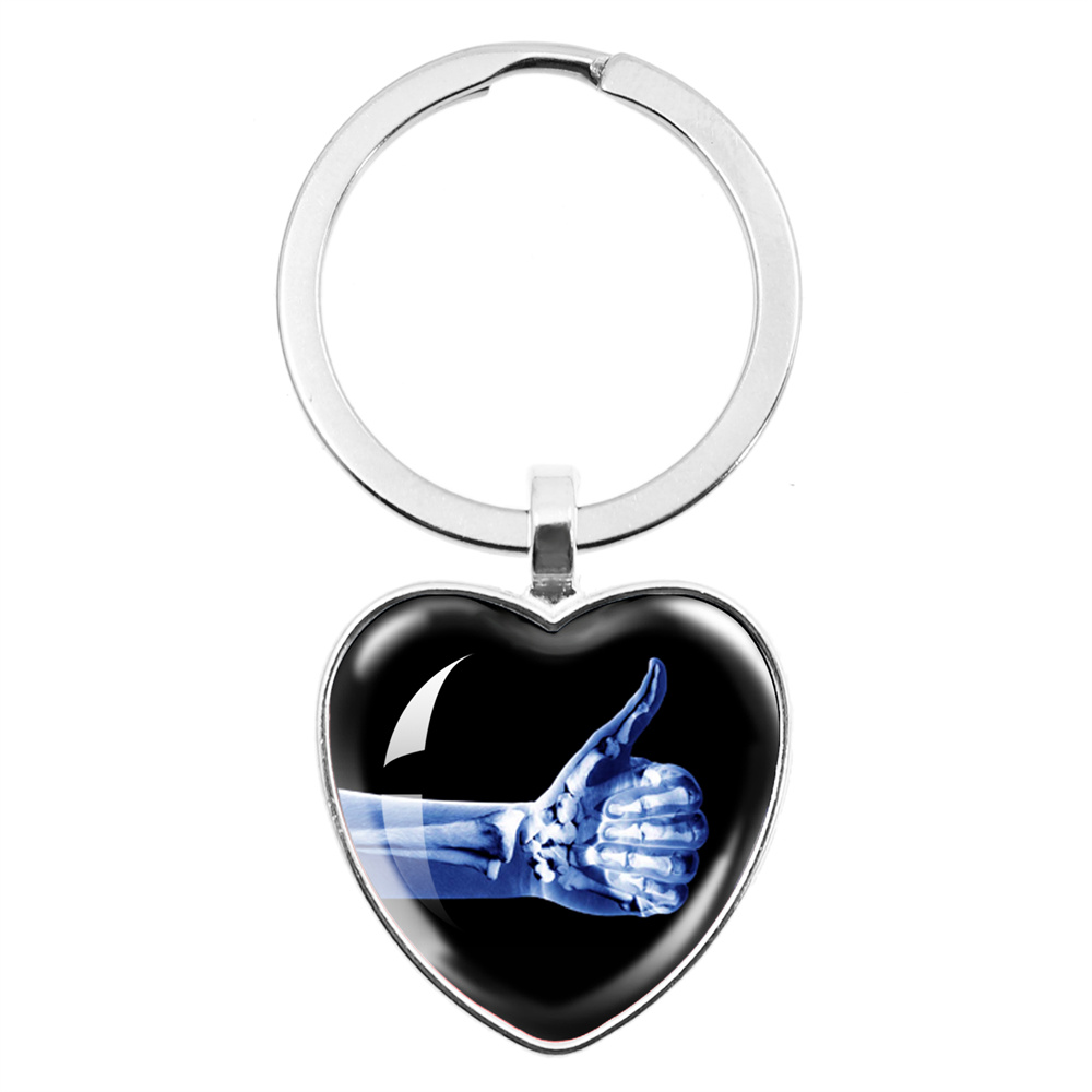 Xbody Health & Wellness Functional Integrative Medicine Office & Medical Spa - X-ray Film Peach Heart Keychain Human